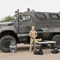 Officer Hughes w/ SWAT MRAP